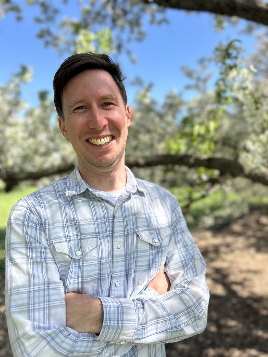 Thomas in an orchard